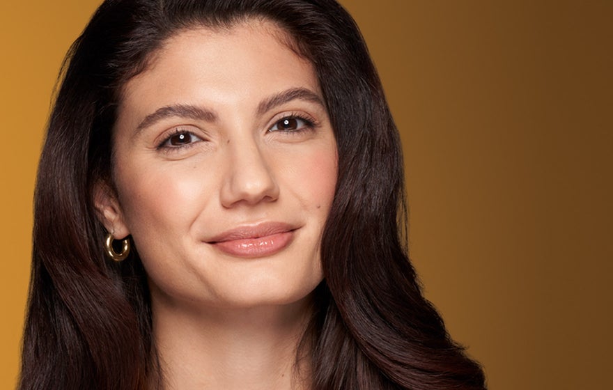 A woman with a confident look after treating her frown lines