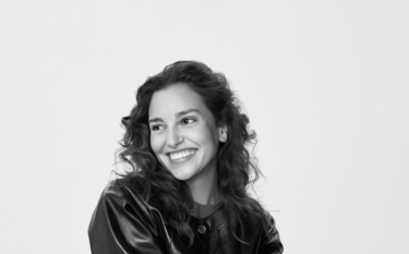 A woman with a confident look after treating her frown lines