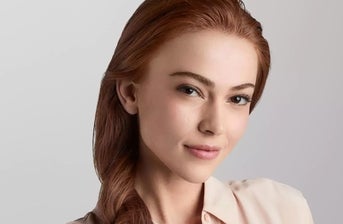 Close-up of woman, in relation to injectable volumizing-style dermal fillers