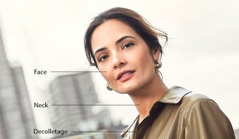 A-woman-with-healthy-looking-skin-on-her-neck,-décolletage,-and-hands