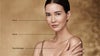 A-woman-with-healthy-looking-skin-on-her-neck,-décolletage,-and-hands